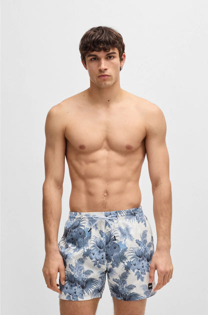 LOGO-BADGE SWIM SHORTS WITH ALL-OVER PRINT