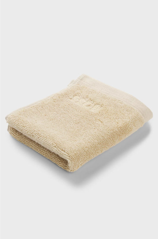 AEGEAN-COTTON FACE CLOTH WITH TONAL LOGO